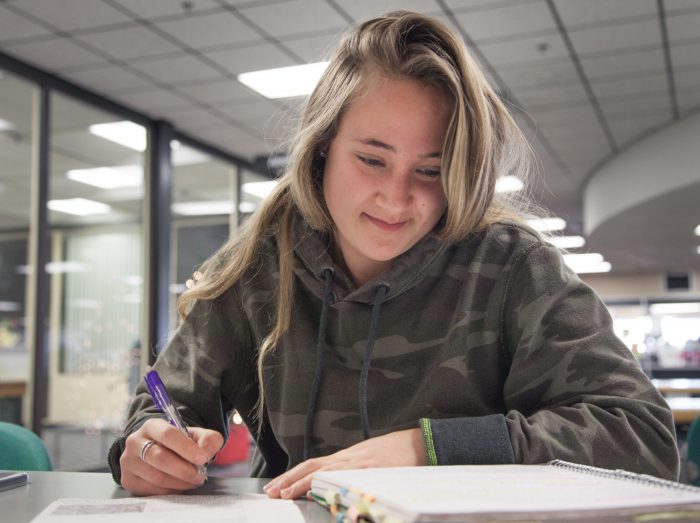 young lady doing homework