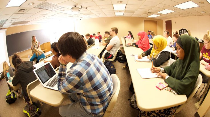 Fisheye view photo of classroom full of students