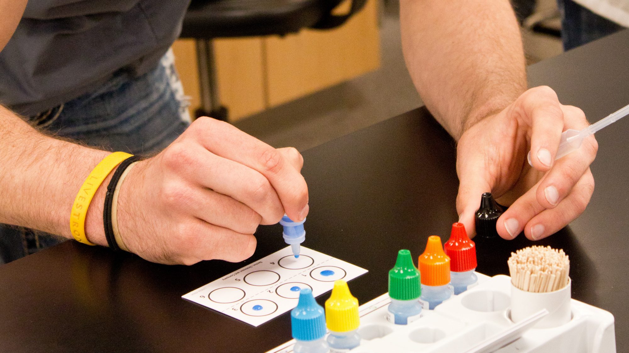 student testing chemicals